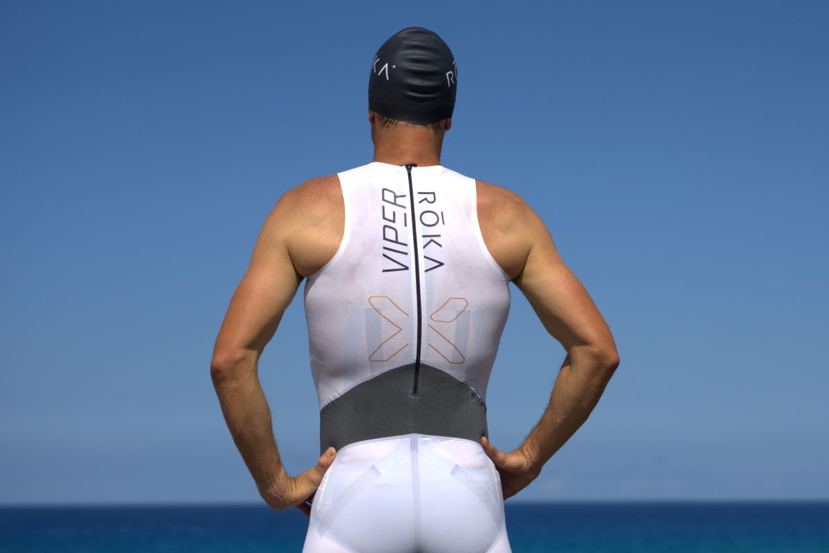 A man wears the Viper X.3 Ghost swimskin
